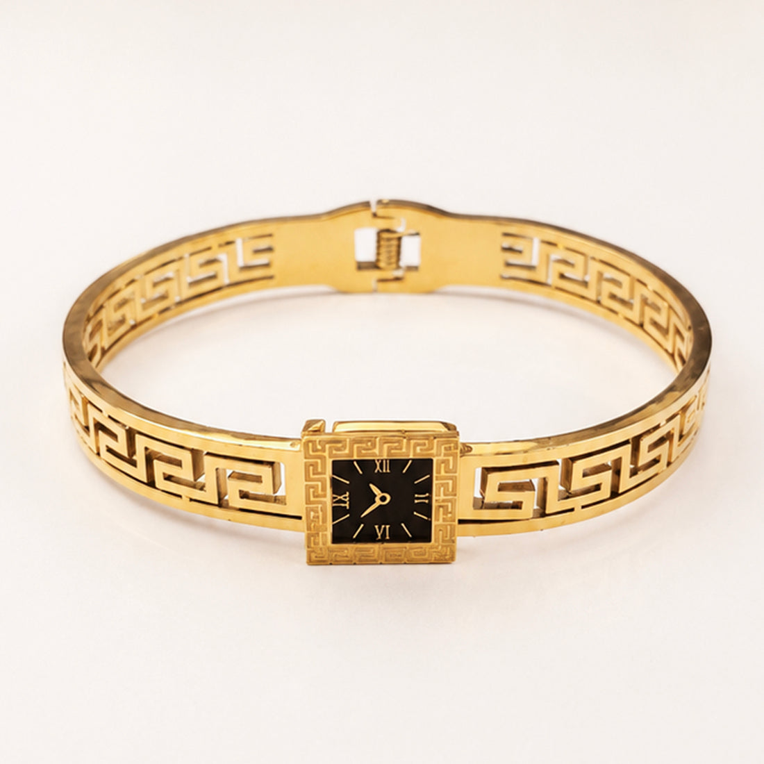 Gold Greek key pattern bangle watch with square black dial