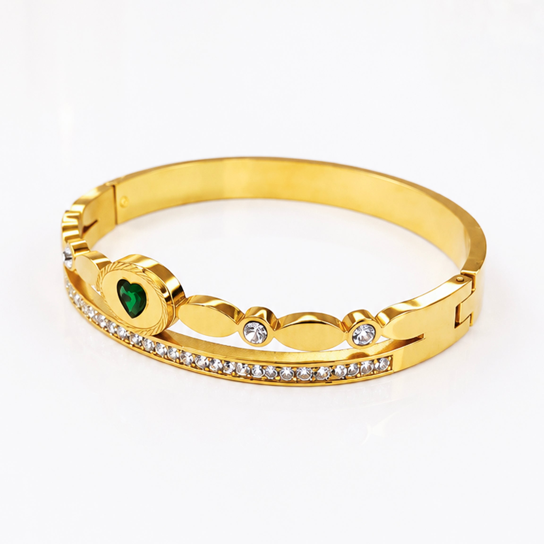Gold-plated bangle bracelet with a green heart gemstone and sparkling cubic zirconia crystals