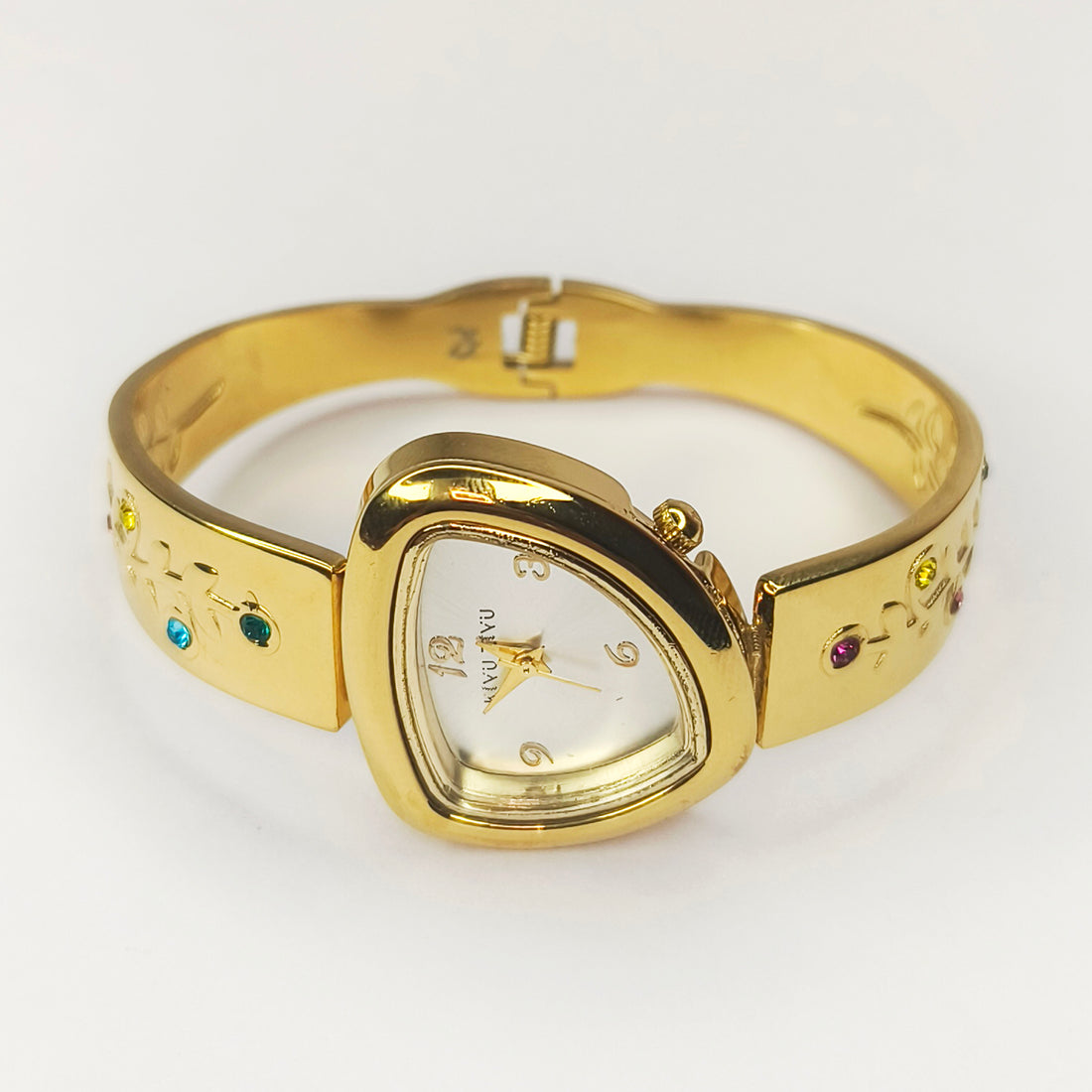 Gold-tone bangle watch with a triangular face and colorful gemstones on the band