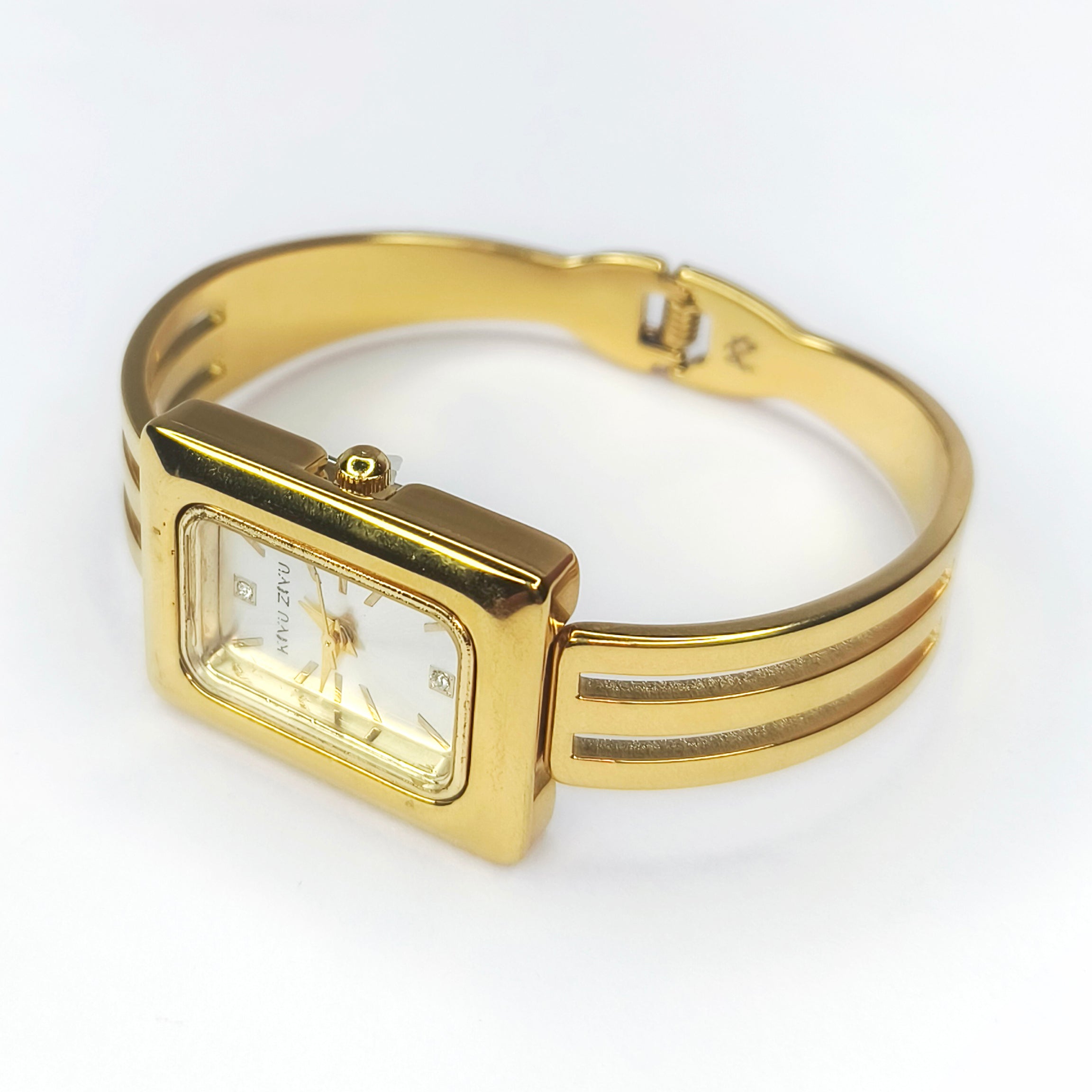 Elegant gold-tone rectangular face ladies' bangle watch with a slim metal bracelet.