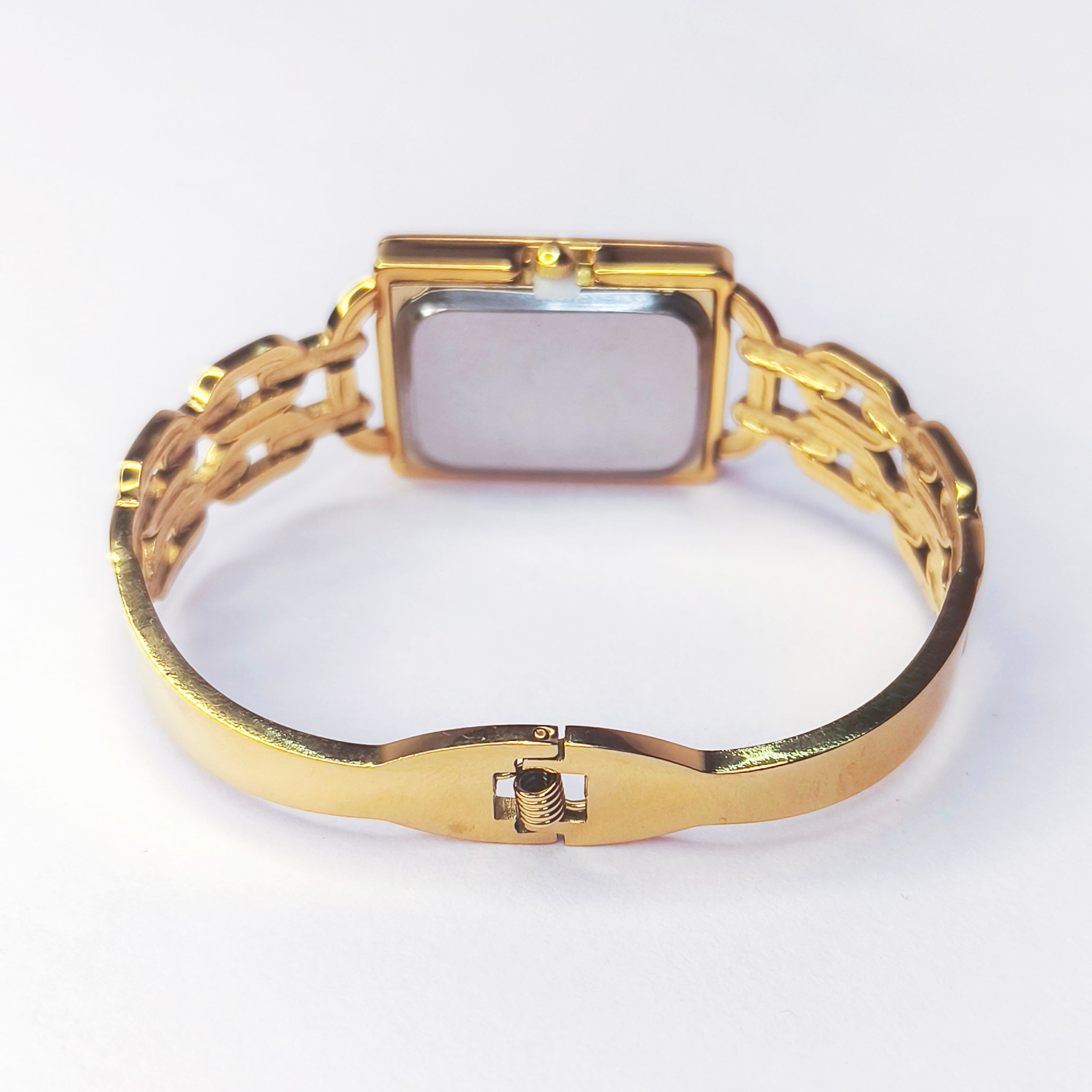 Elegant gold-tone ladies' rectangular watch with a decorative link bracelet.