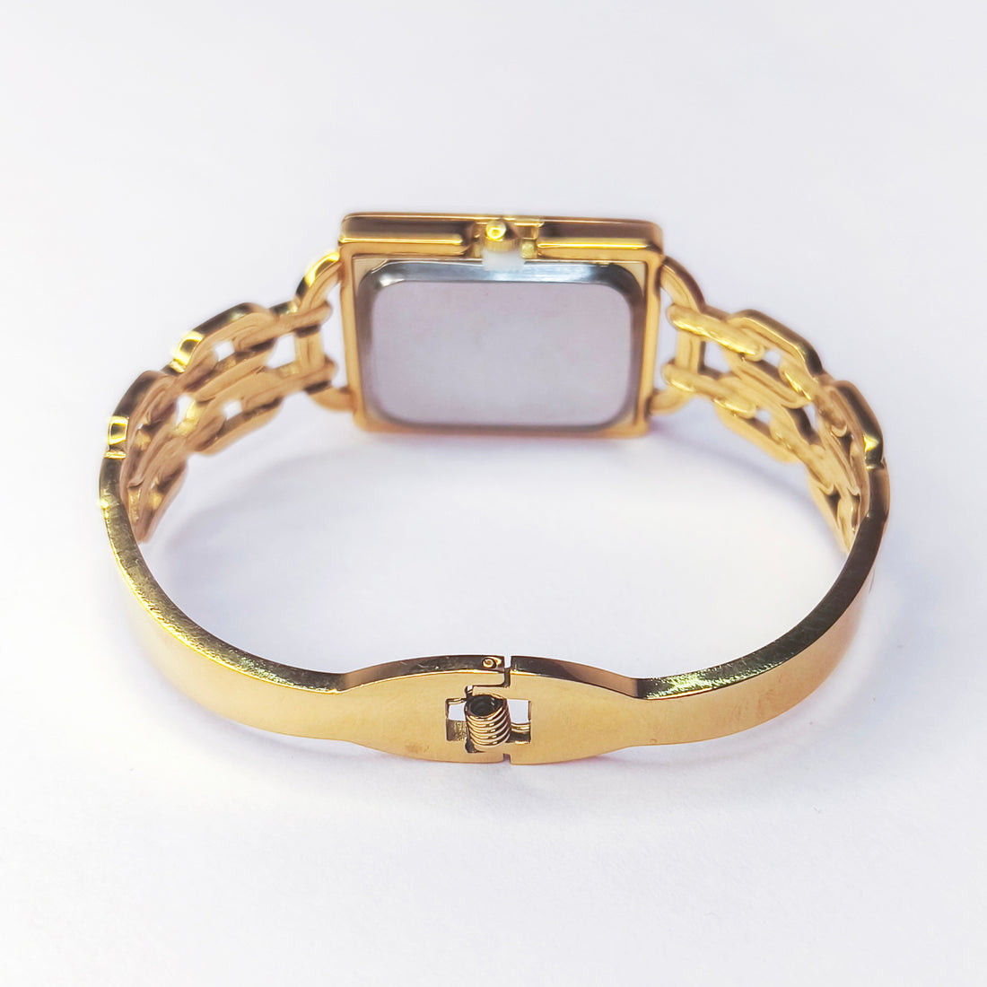 Elegant gold-tone ladies' rectangular watch with a decorative link bracelet.